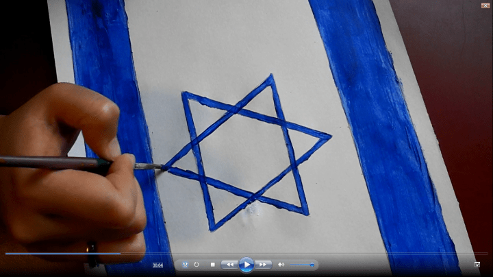 clip from video footage that we shot today - my talented friend Kara painting the flag